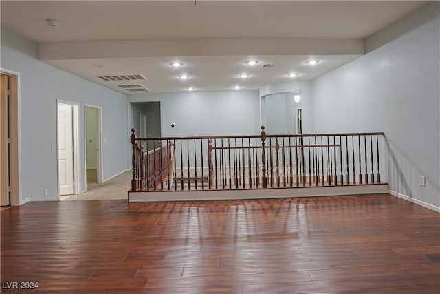 spare room featuring hardwood / wood-style flooring