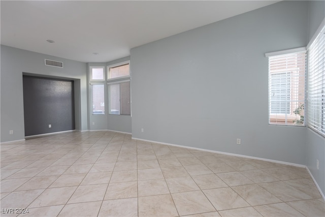 view of tiled spare room