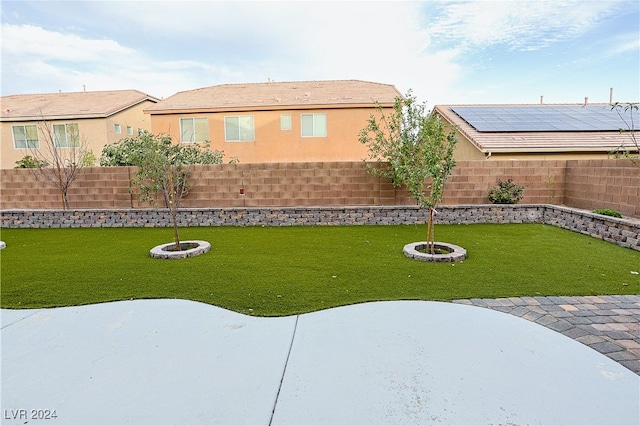 view of yard with a fire pit