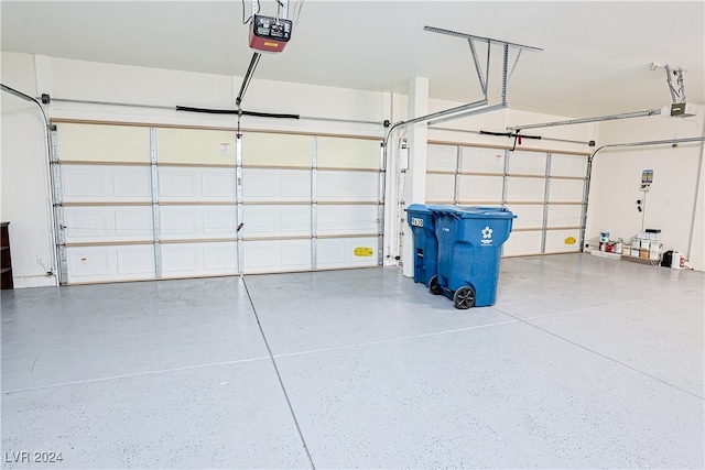 garage featuring a garage door opener