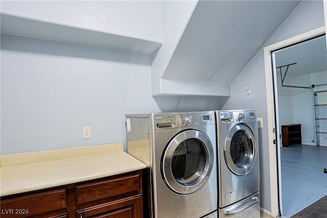 laundry room featuring washing machine and clothes dryer