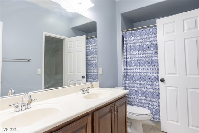 bathroom with vanity, toilet, tile patterned flooring, and a shower with shower curtain