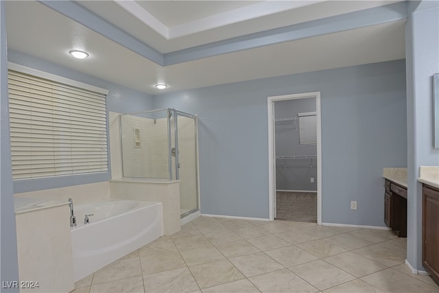 bathroom featuring vanity, plus walk in shower, and tile patterned flooring