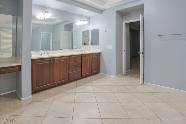 bathroom featuring vanity and tile patterned flooring