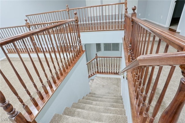 stairs with carpet floors