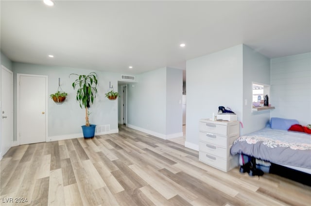 bedroom with light hardwood / wood-style flooring