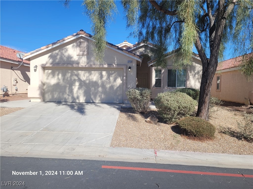 view of front of house with a garage