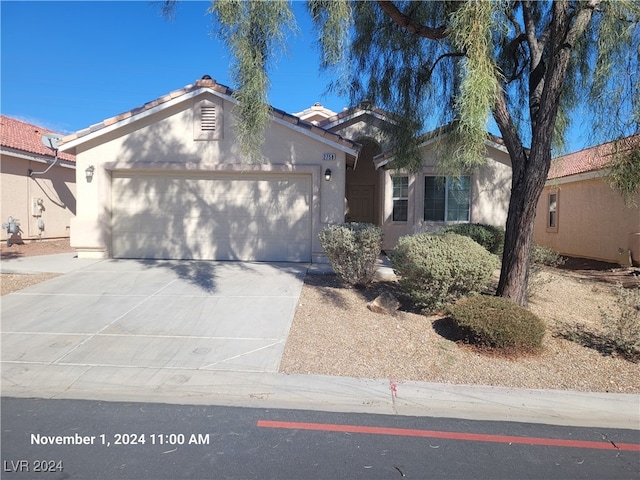 view of front of house with a garage