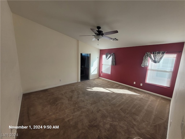 carpeted empty room featuring ceiling fan