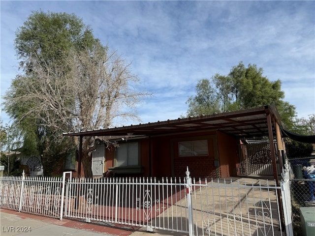 view of front facade with a carport