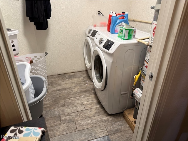 laundry area with washing machine and dryer