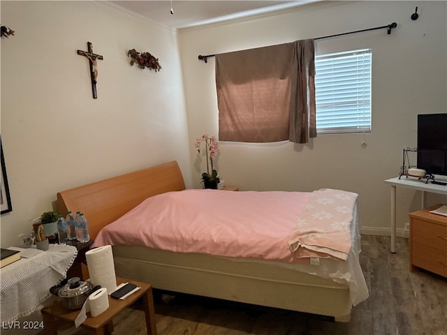 bedroom featuring hardwood / wood-style floors