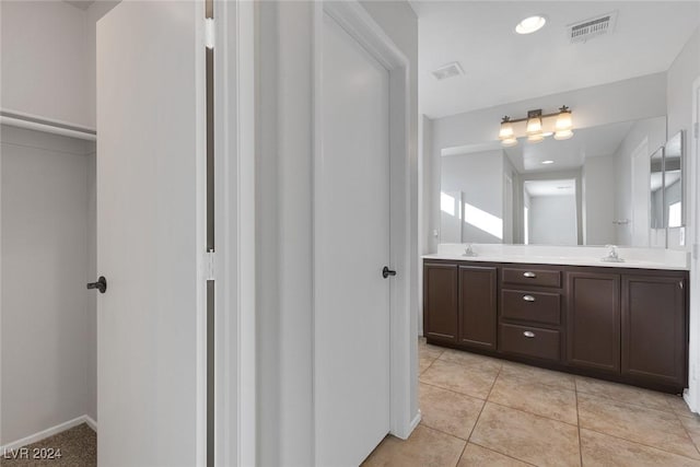 bathroom featuring vanity and tile patterned floors