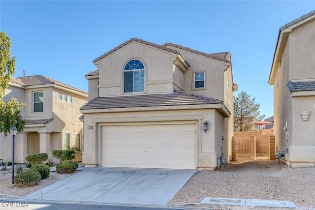 front of property with a garage