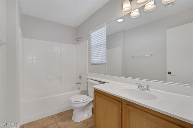 full bathroom featuring vanity, tub / shower combination, tile patterned floors, and toilet