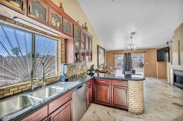 kitchen featuring kitchen peninsula, a chandelier, vaulted ceiling, dishwasher, and sink