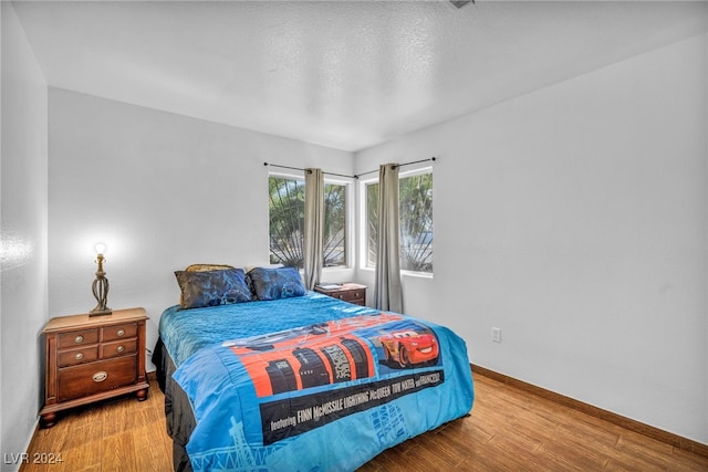 bedroom featuring hardwood / wood-style floors