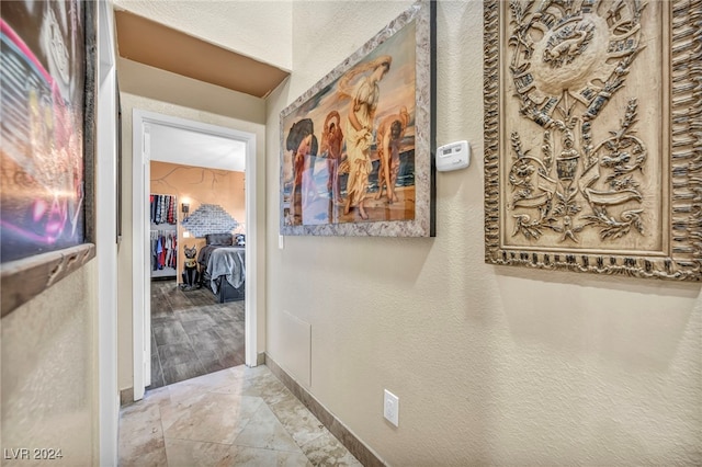 hall with light hardwood / wood-style flooring