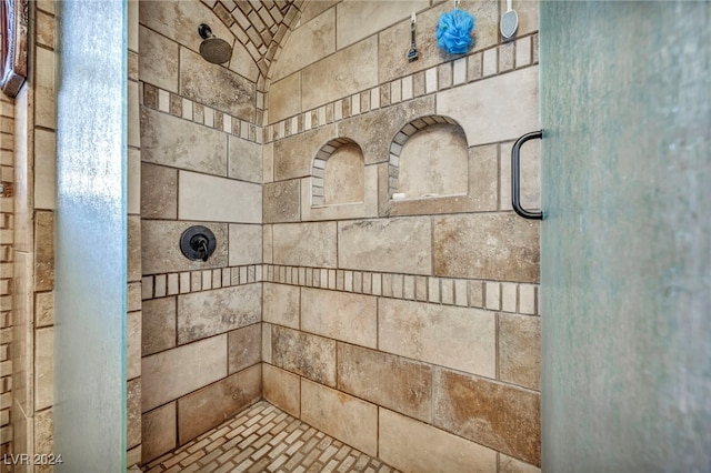 interior details featuring an enclosed shower