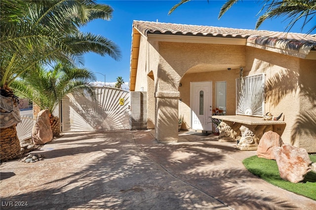 view of side of property with a garage