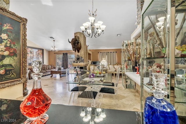 interior space with lofted ceiling and an inviting chandelier