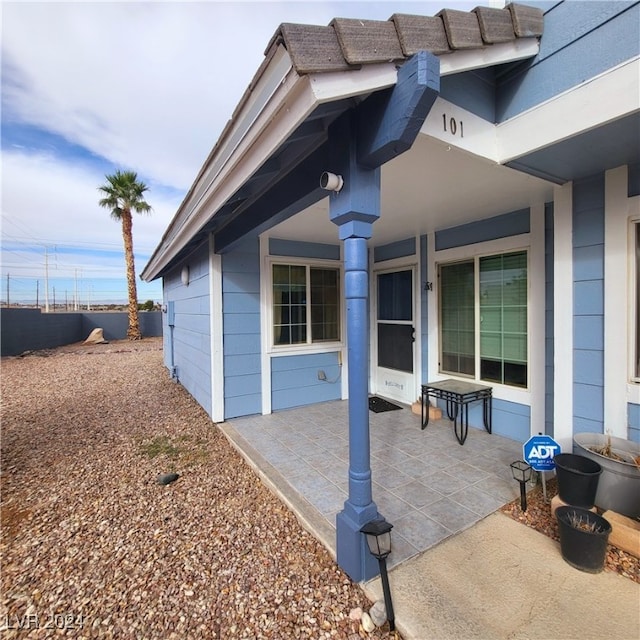 view of property exterior with a patio