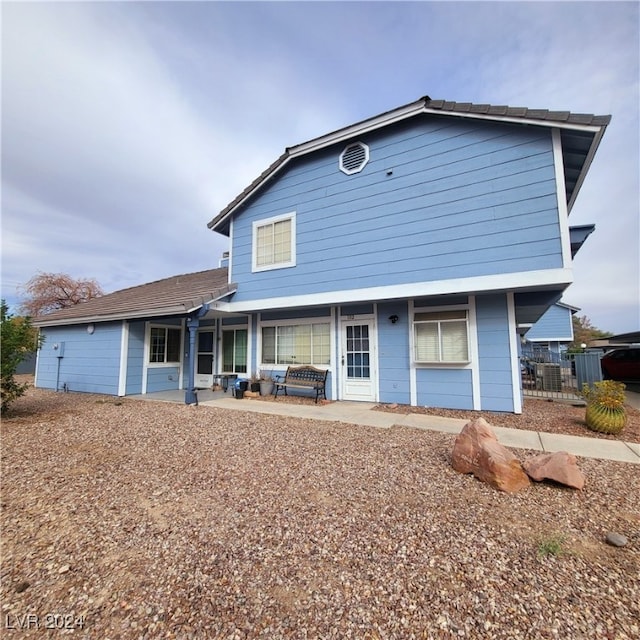 rear view of house featuring a patio area