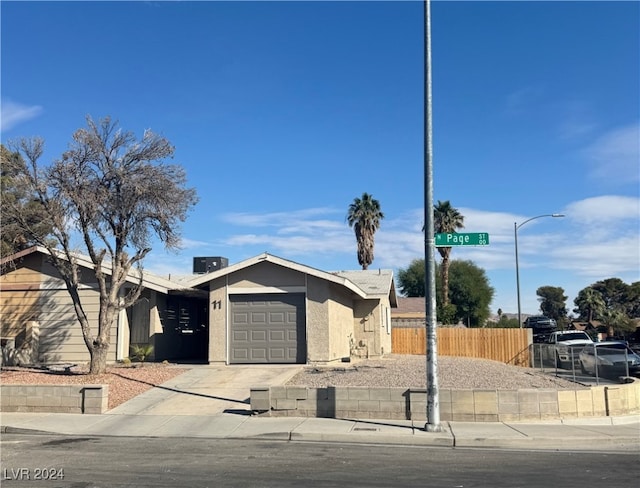 single story home featuring a garage