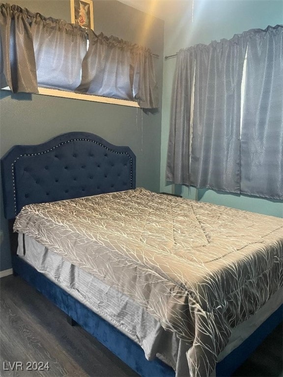 bedroom featuring wood-type flooring