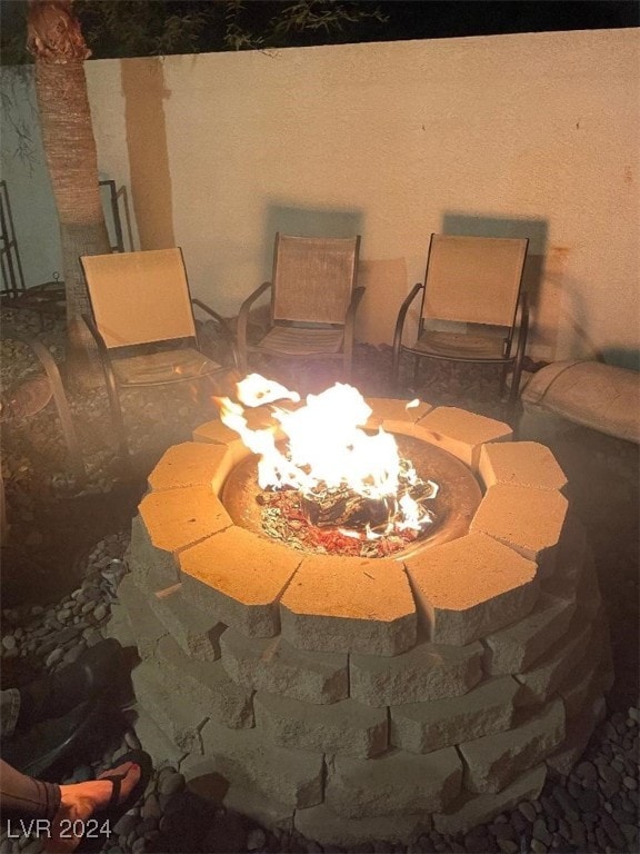 details featuring an outdoor fire pit