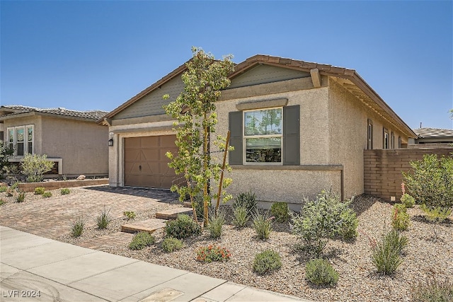 view of front of home featuring a garage