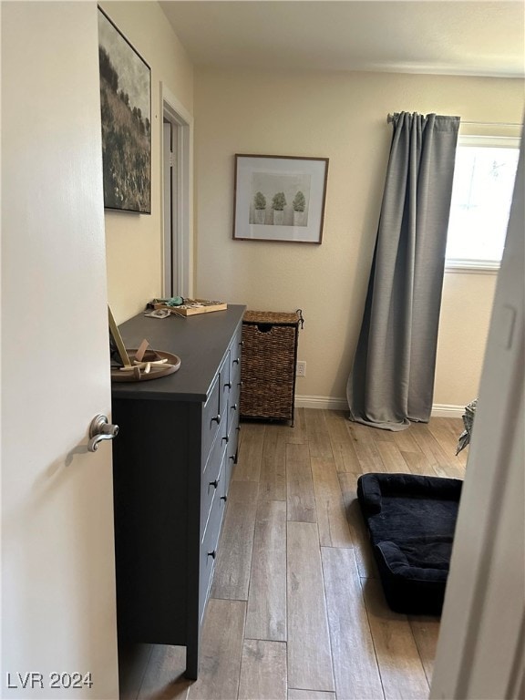 bathroom featuring vanity and hardwood / wood-style floors