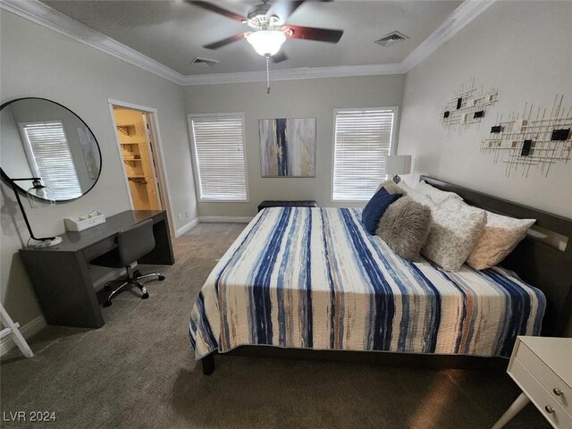 carpeted bedroom with ceiling fan and ornamental molding