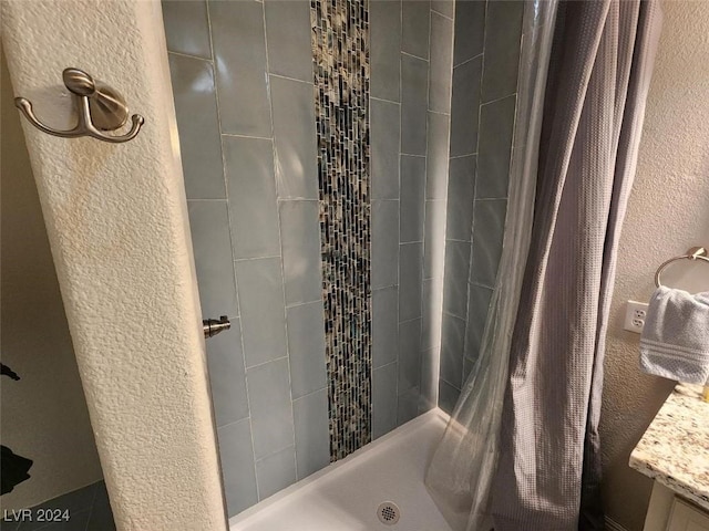 bathroom featuring walk in shower