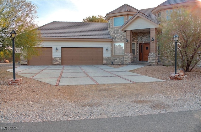 view of front of property with a garage