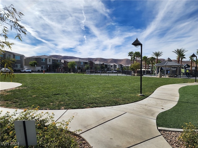 view of home's community with a gazebo and a lawn