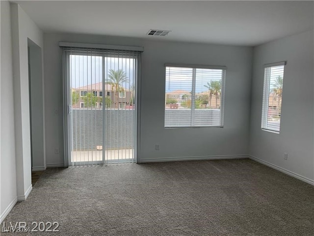 view of carpeted spare room