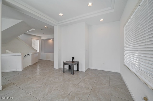 unfurnished room featuring light tile patterned floors