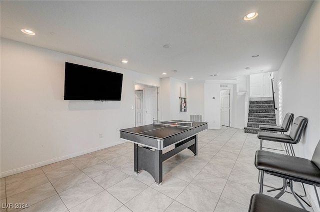 recreation room featuring light tile patterned flooring