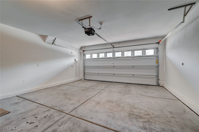 garage featuring a garage door opener