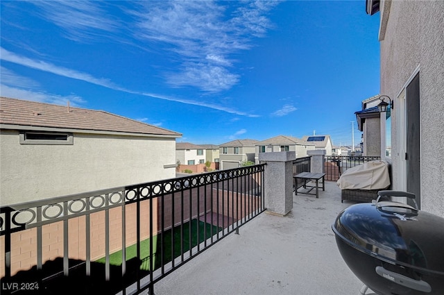 balcony featuring area for grilling