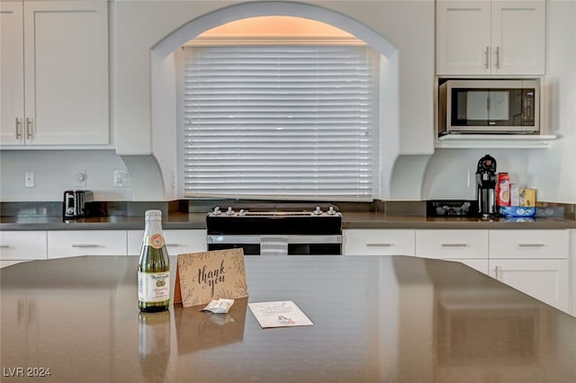 kitchen featuring white cabinets and stainless steel appliances