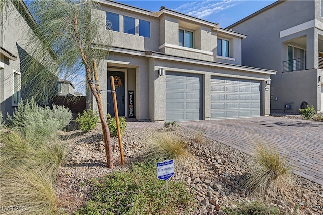 view of front of home with a garage