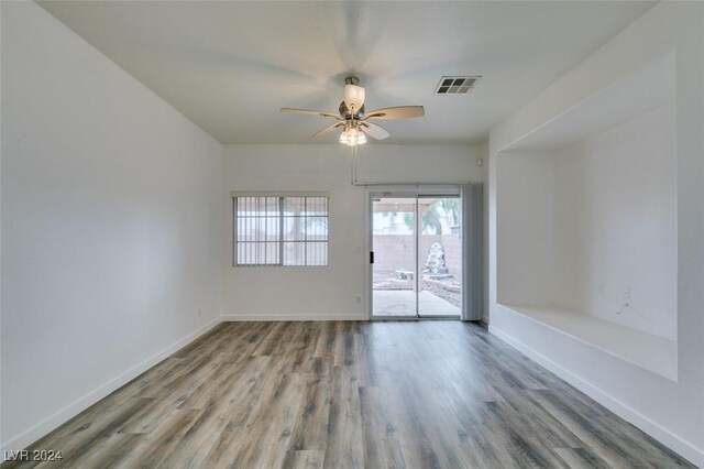 6214 Osaka Pearl St, North Las Vegas, NV 89031 - unfurnished room with wood finished floors and a ceiling fan