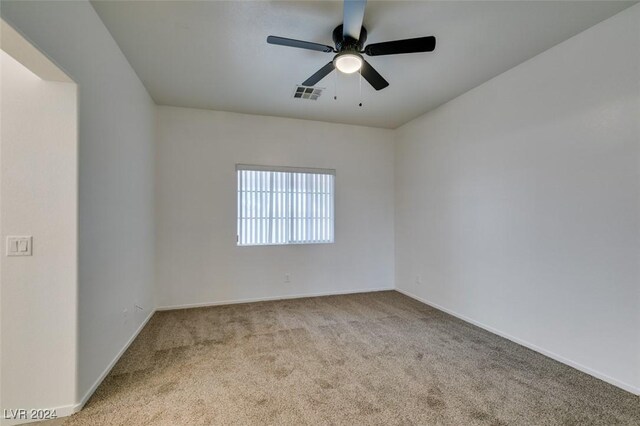 6214 Osaka Pearl St, North Las Vegas, NV 89031 - carpeted empty room with a ceiling fan and baseboards