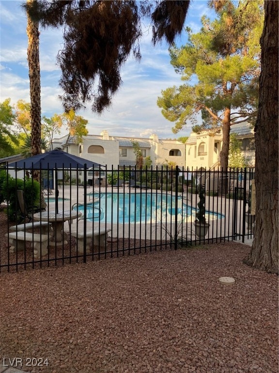 view of swimming pool featuring a patio