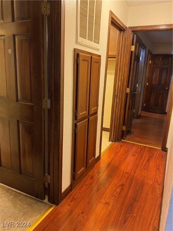 corridor featuring light wood-type flooring