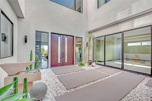 doorway to property with a patio and french doors