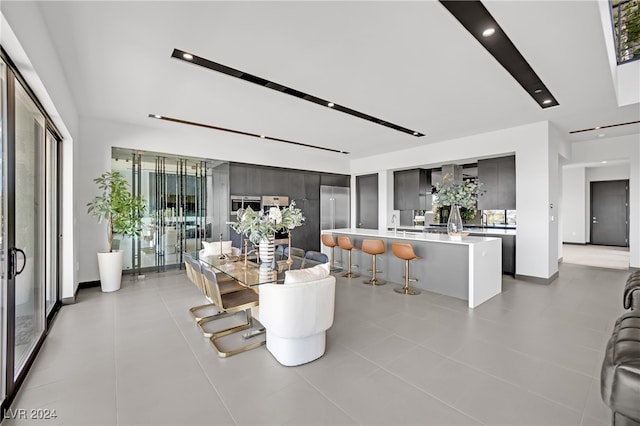 dining room featuring light tile patterned floors