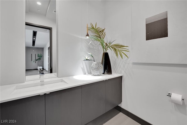 bathroom featuring vanity and tile patterned flooring